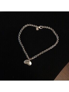 Sterling. 999 Silver Purity Bean Rolo Bracelet